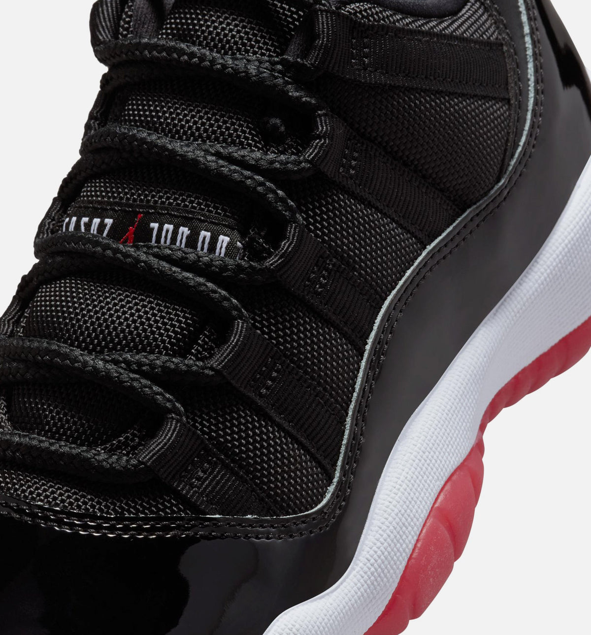 Air Jordan 11 Retro Bred Grade School Sneakers - Black / Varsity Red / White